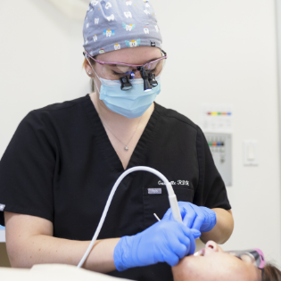 lady laying in exam room