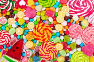 Bird's eye view of a variety of sweets and candy in many colors